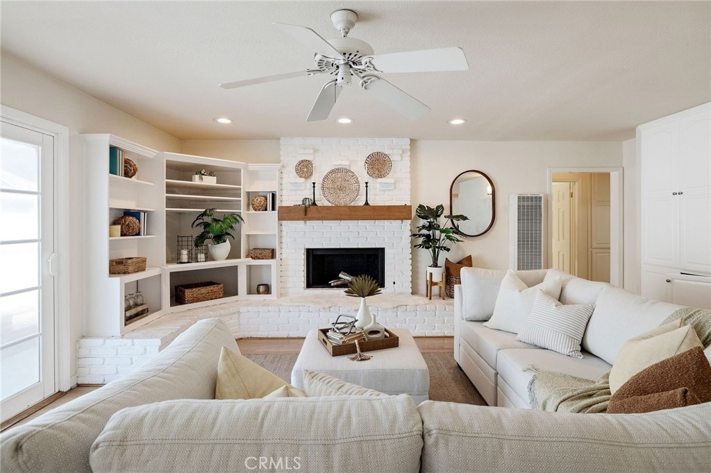 4914 Halison Street Torrance, CA 90503 - Photo 27 of 51 a living room with furniture fireplace and window