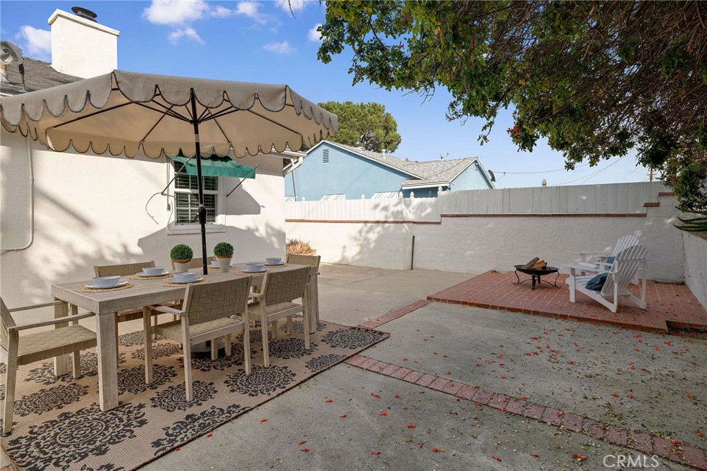 4914 Halison Street Torrance, CA 90503 - Photo 36 of 51 a view of a chairs and table in the patio