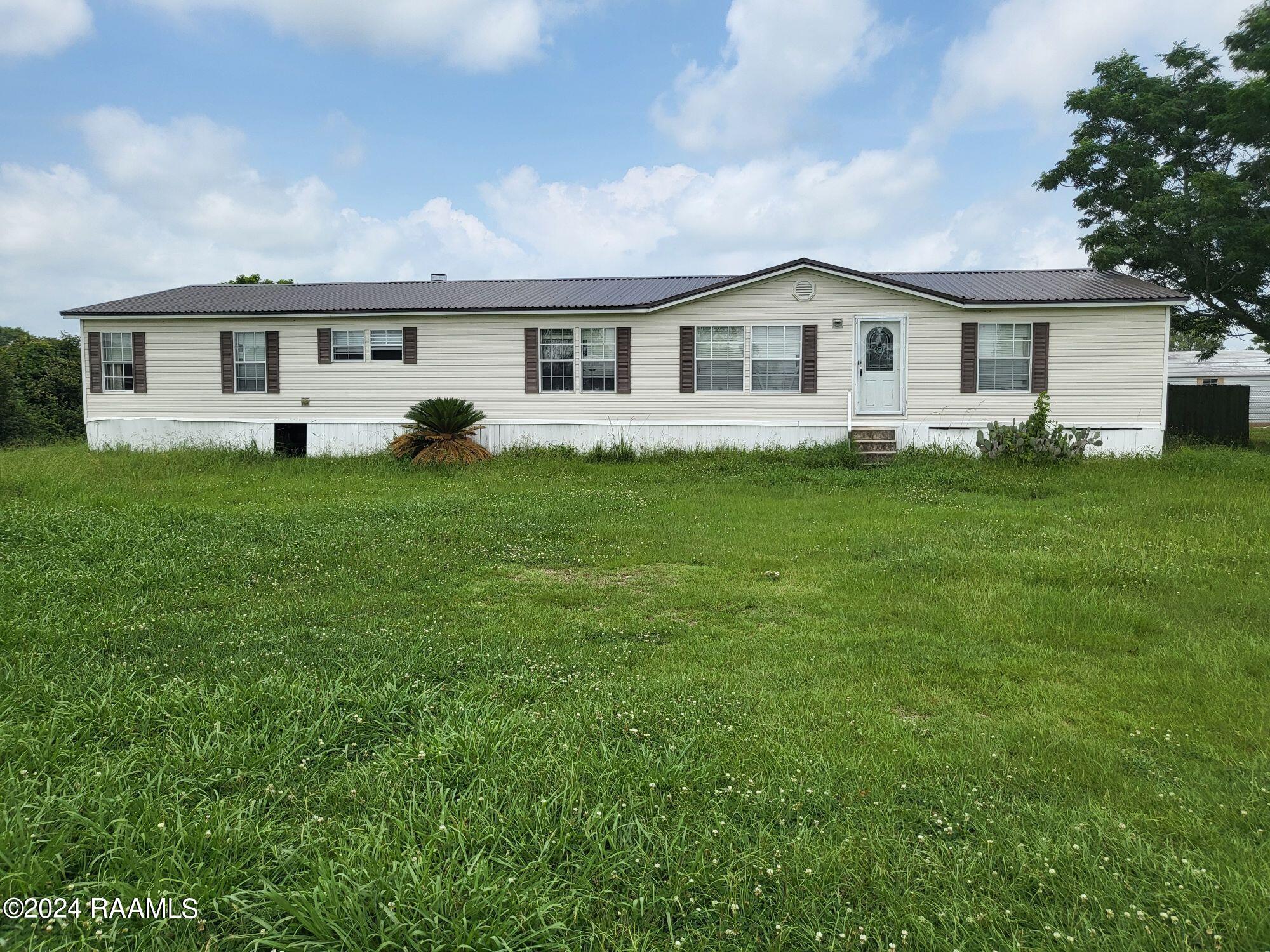 175 Choupique Road Opelousas, LA 70570 - Photo 1 of 22 Front View