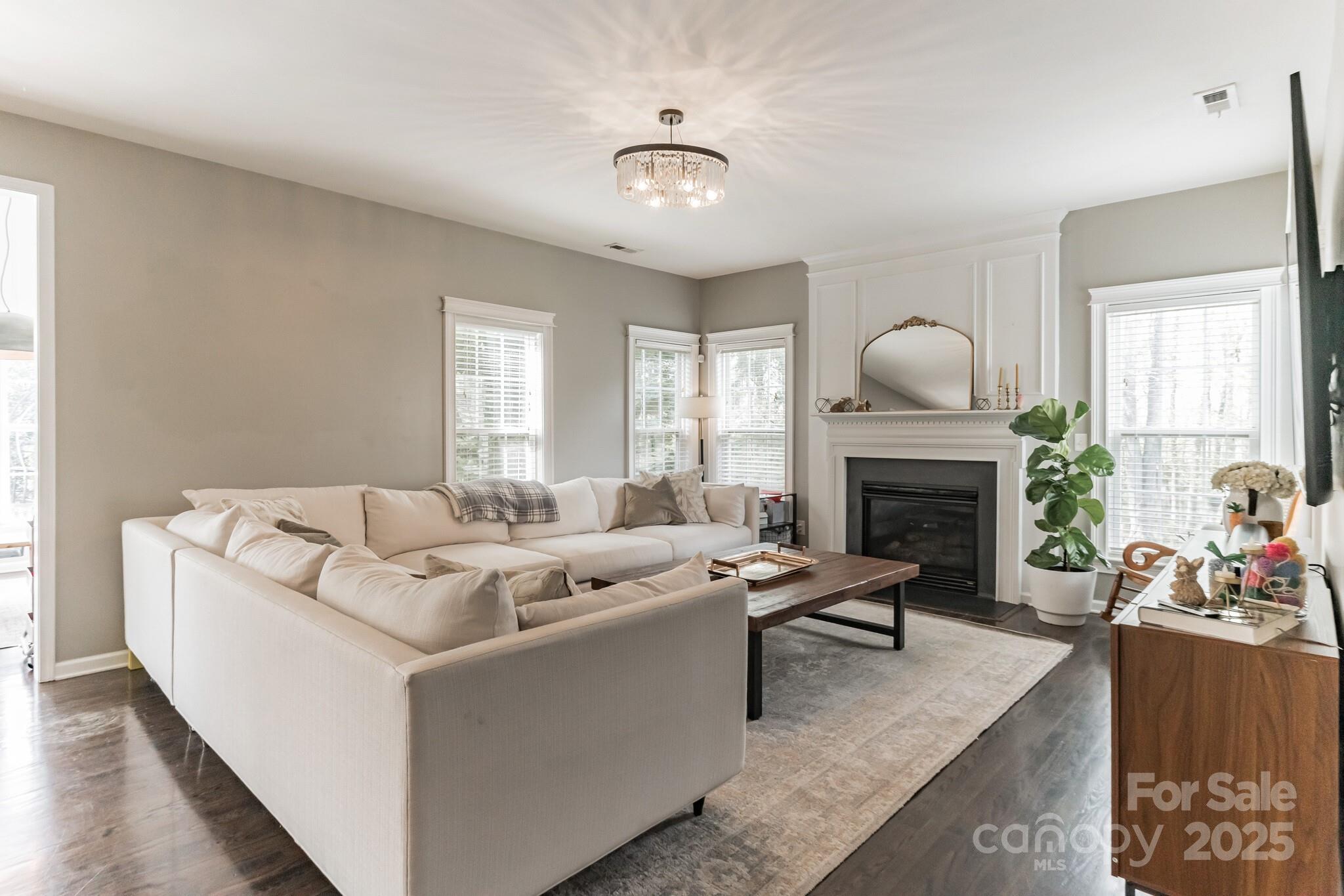 7215 Meyer Road Fort Mill, SC 29715 - Photo 12 of 35 a living room with furniture and a fireplace
