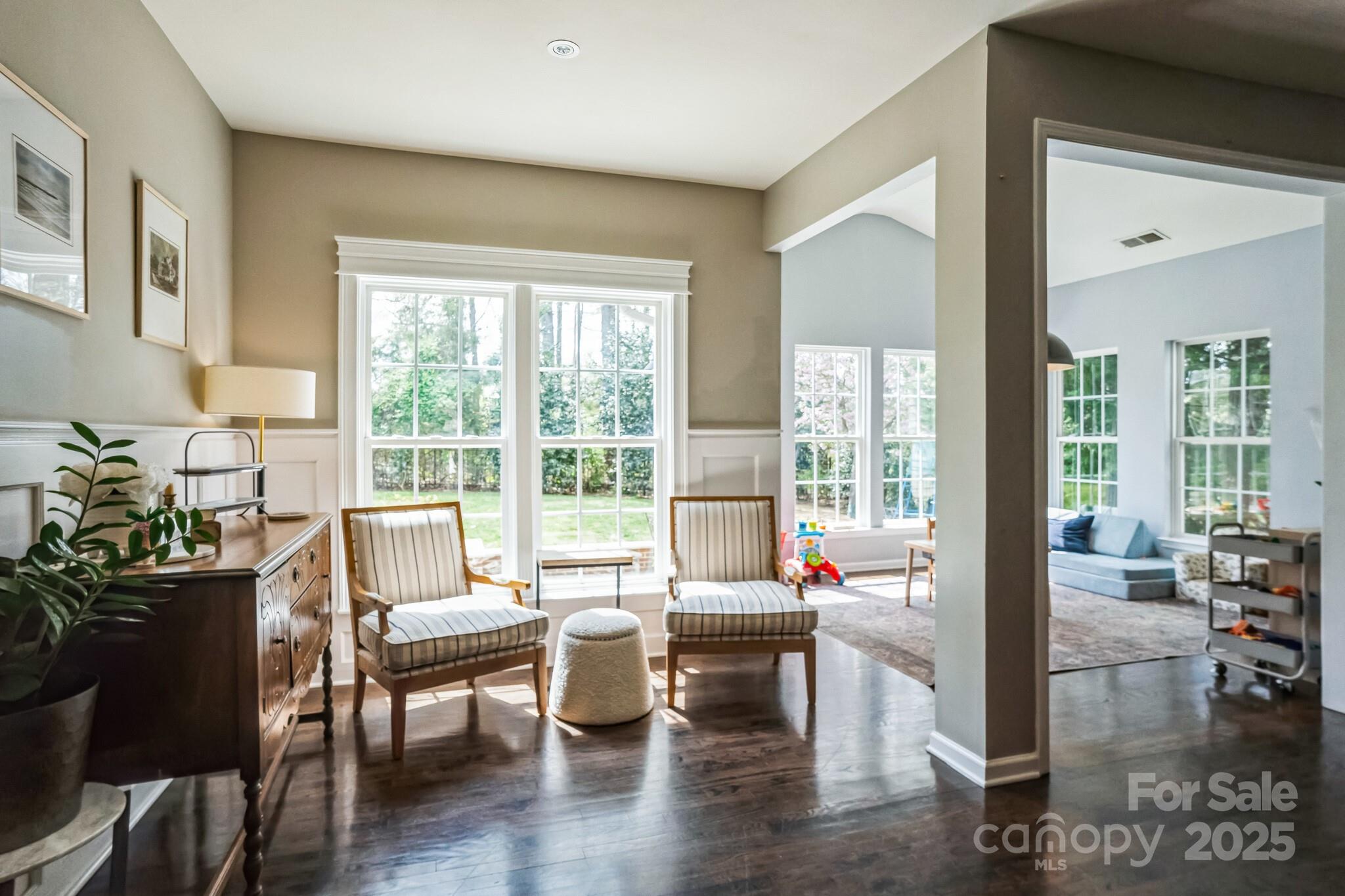 7215 Meyer Road Fort Mill, SC 29715 - Photo 16 of 35 a living room filled with furniture and floor to ceiling windows
