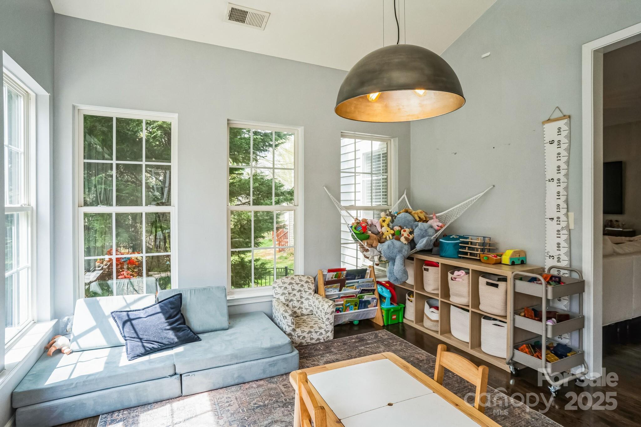 7215 Meyer Road Fort Mill, SC 29715 - Photo 17 of 35 a living room with furniture and a large window