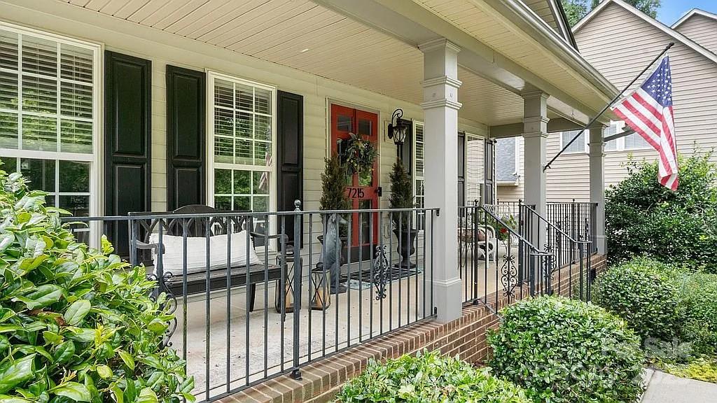 7215 Meyer Road Fort Mill, SC 29715 - Photo 2 of 35 a view of a house with a small yard and plants
