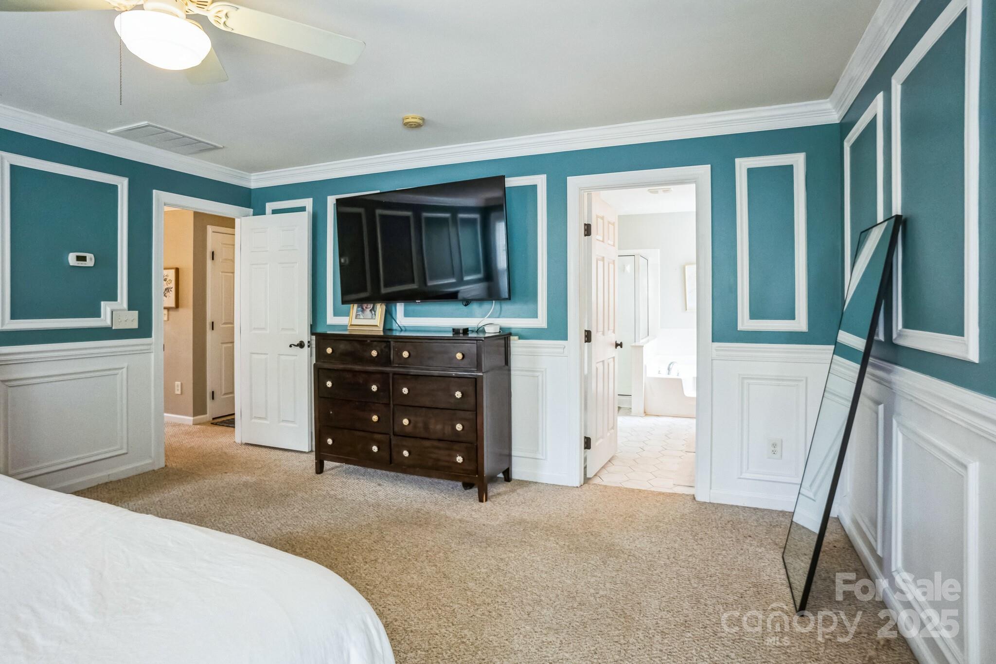 7215 Meyer Road Fort Mill, SC 29715 - Photo 22 of 35 a living room with a dresser and a flat screen tv