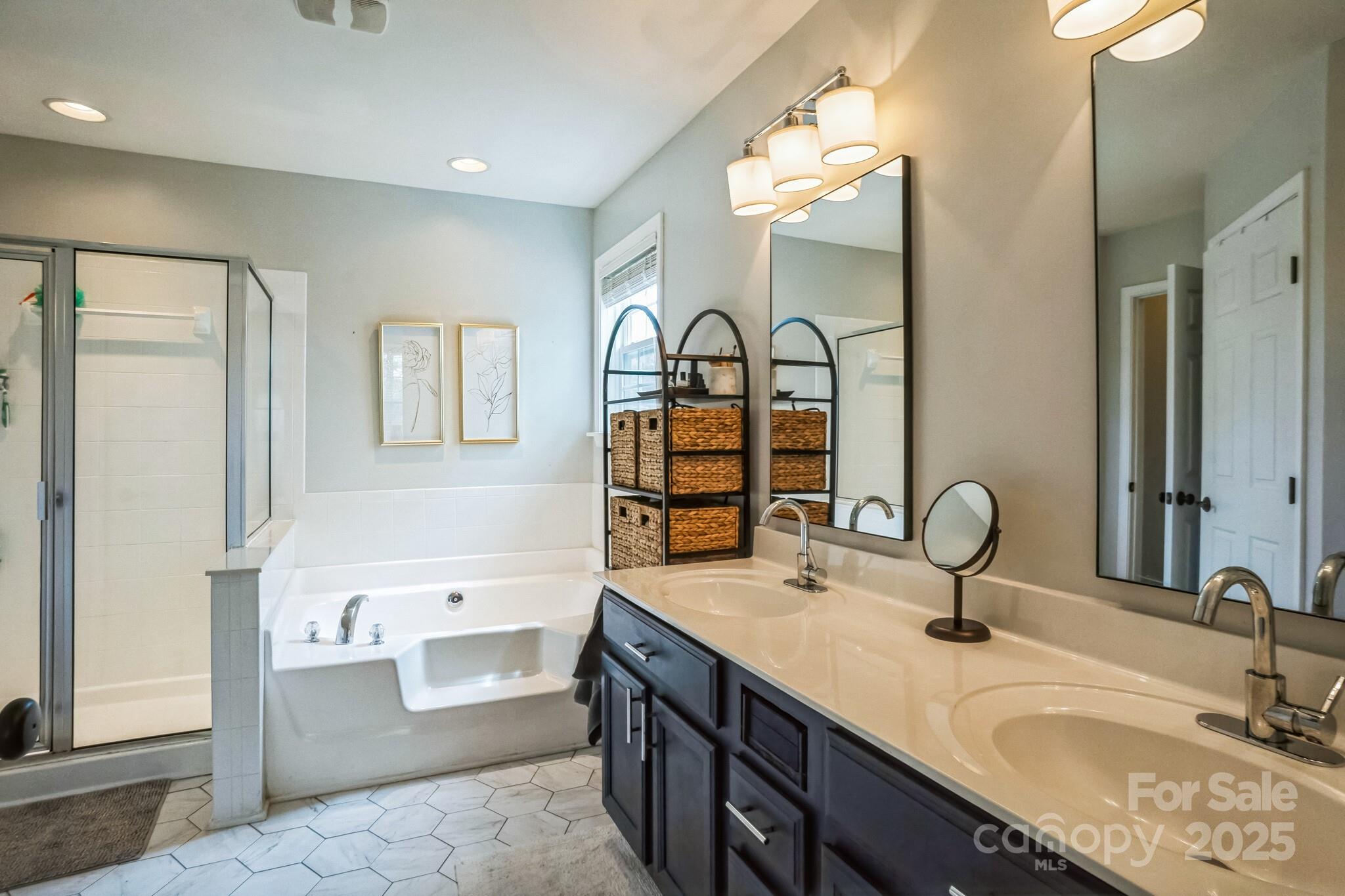 7215 Meyer Road Fort Mill, SC 29715 - Photo 23 of 35 a bathroom with a double vanity sink double mirror and bathtub
