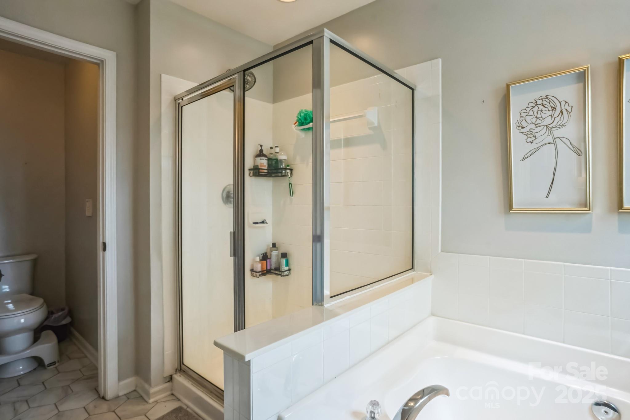 7215 Meyer Road Fort Mill, SC 29715 - Photo 24 of 35 a bathroom with a tub and shower
