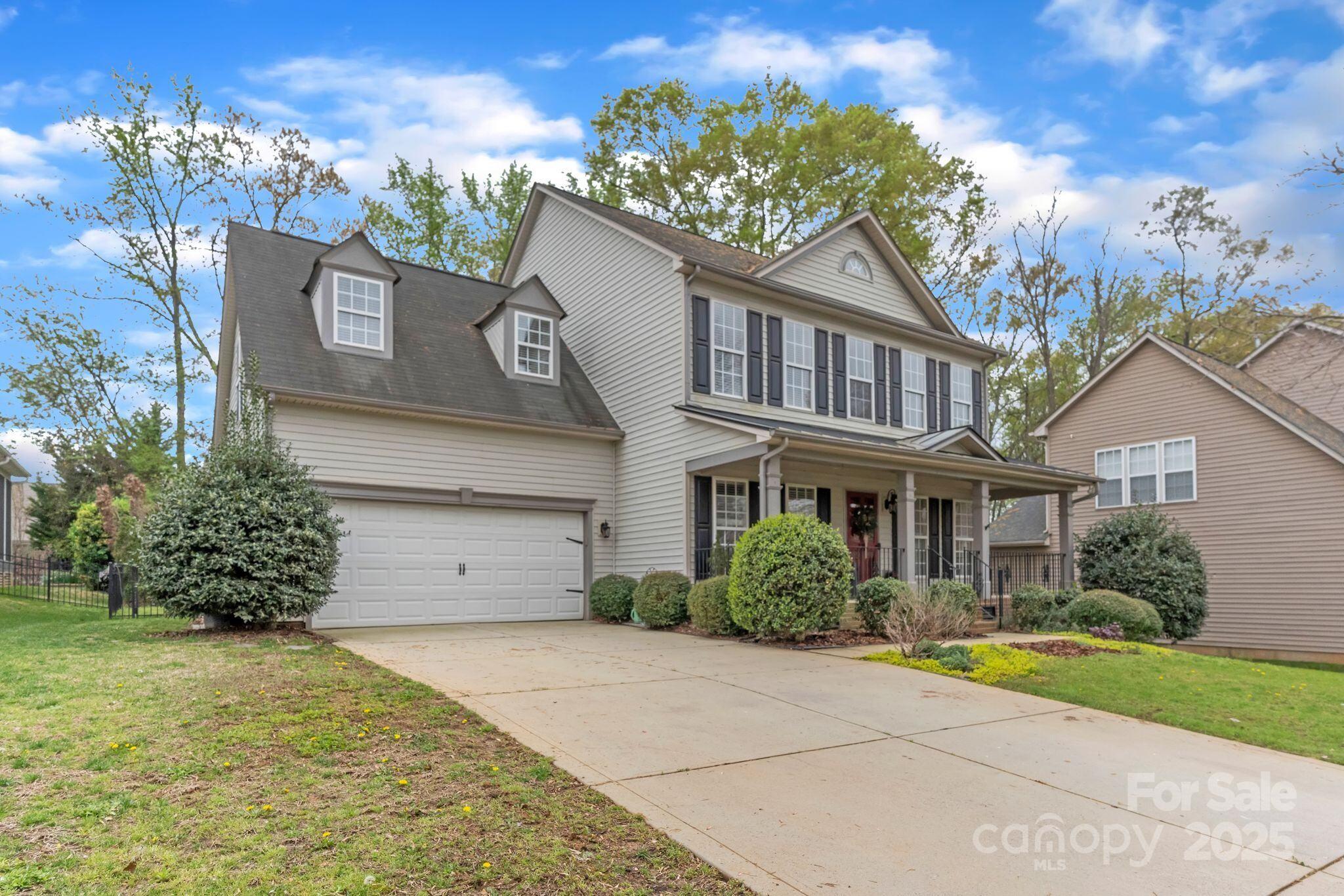 7215 Meyer Road Fort Mill, SC 29715 - Photo 3 of 35 front view of a house with a yard