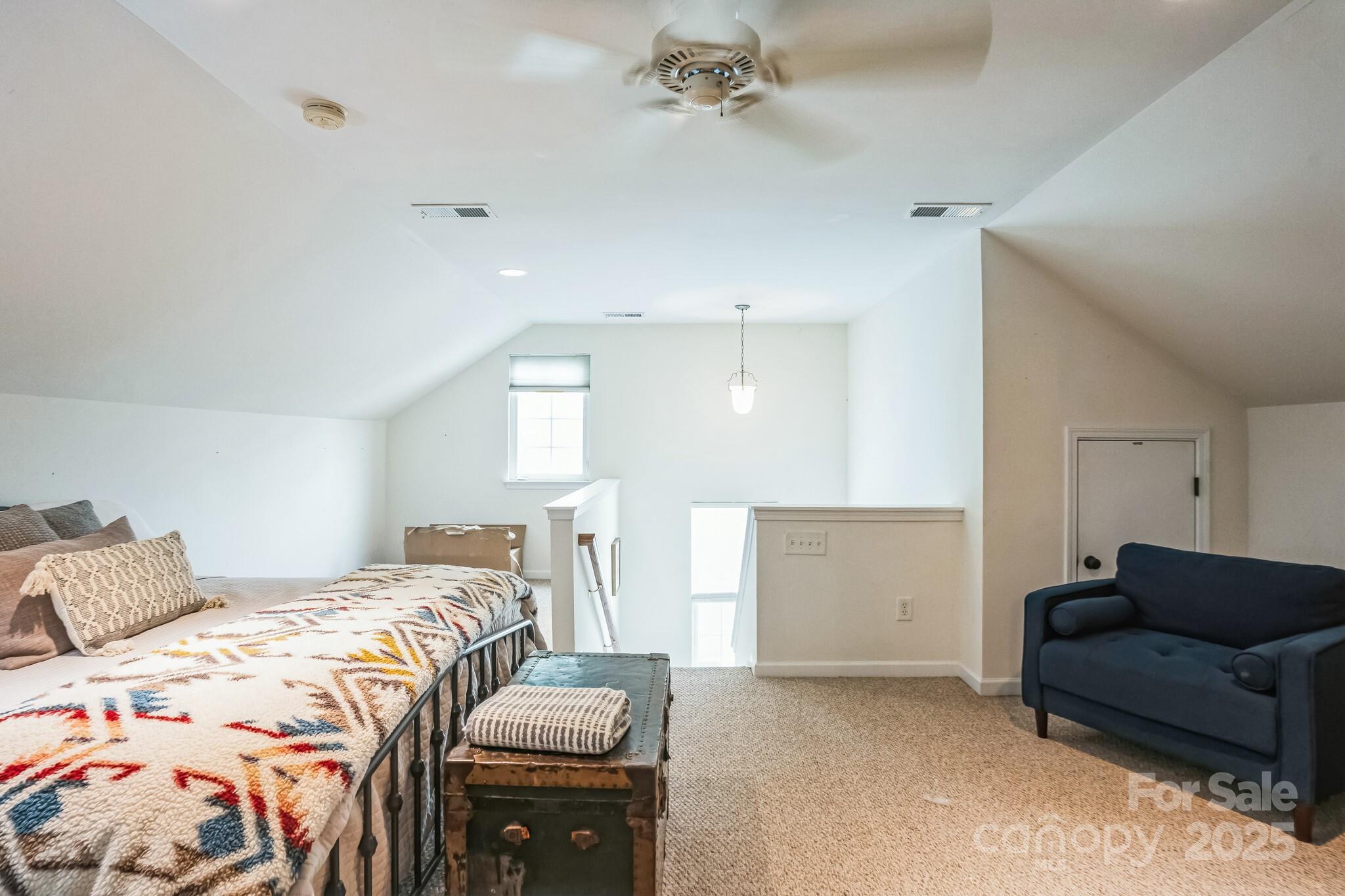 7215 Meyer Road Fort Mill, SC 29715 - Photo 34 of 35 a bedroom with a bed and a couch