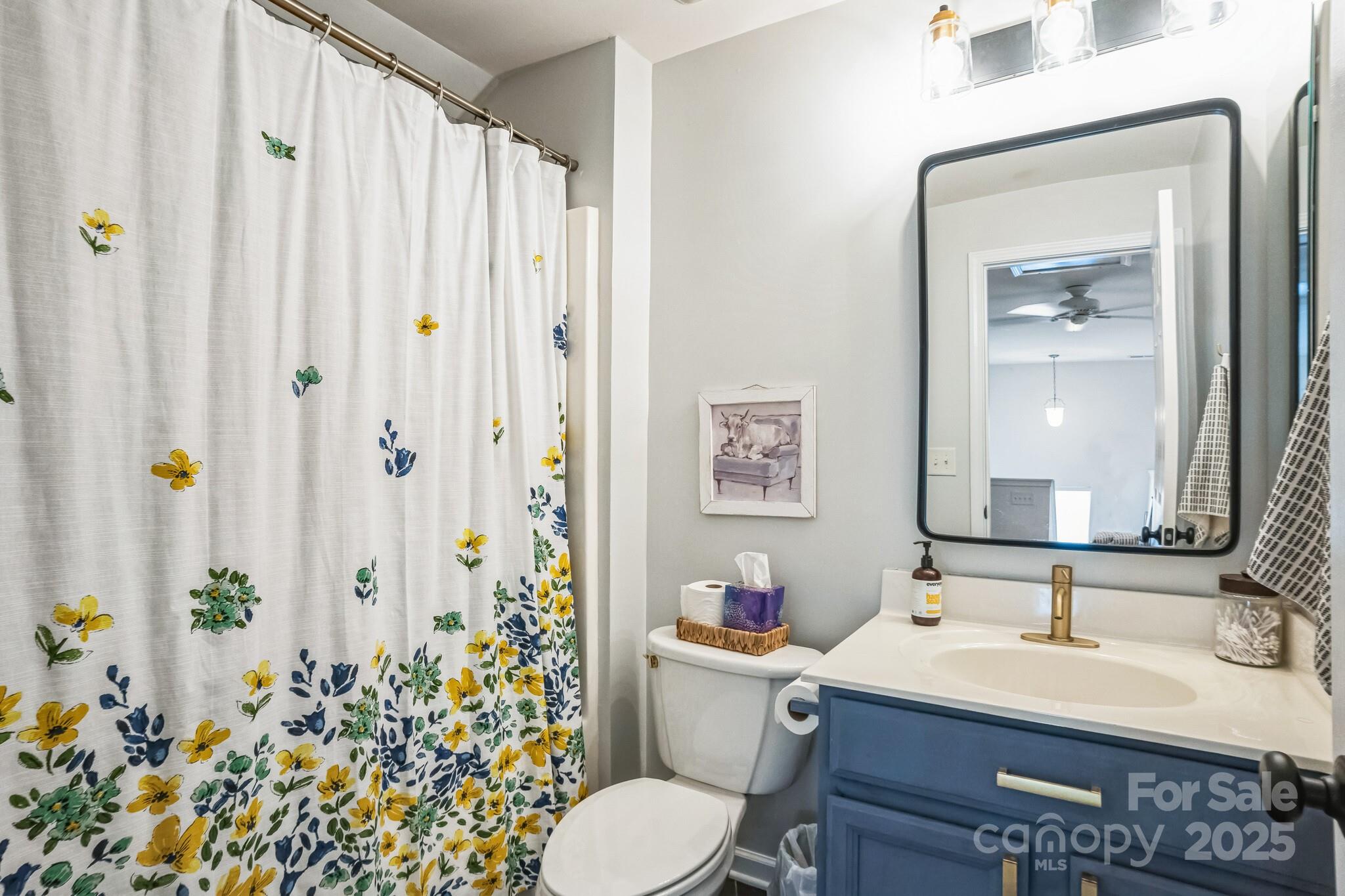 7215 Meyer Road Fort Mill, SC 29715 - Photo 35 of 35 a bathroom with a sink toilet and shower