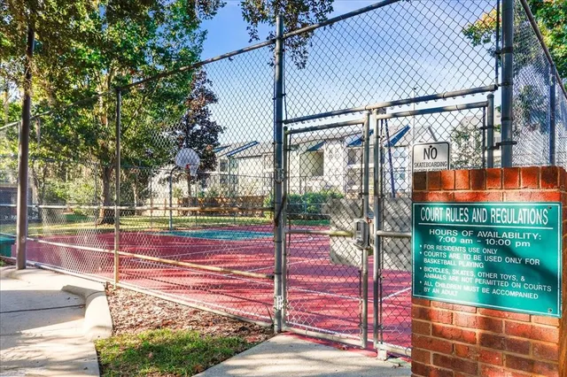 a view of park with seating space and trees