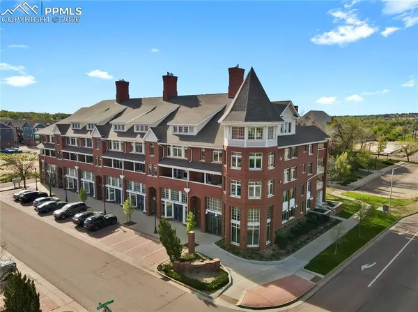 a front view of a building with street view