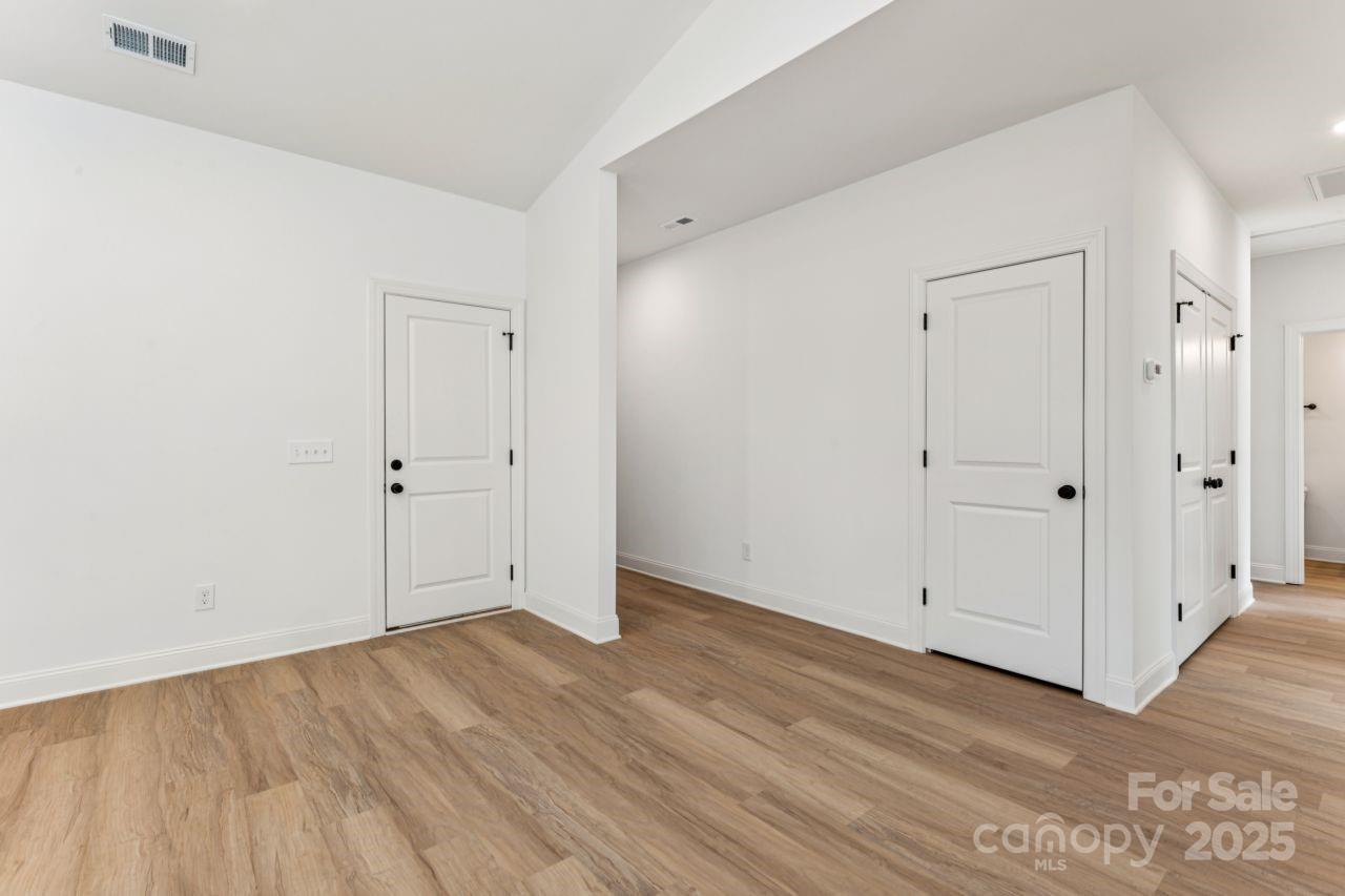 2605 Easter Street Maiden, NC 28650 - Photo 11 of 36 a view of an empty room with wooden floor