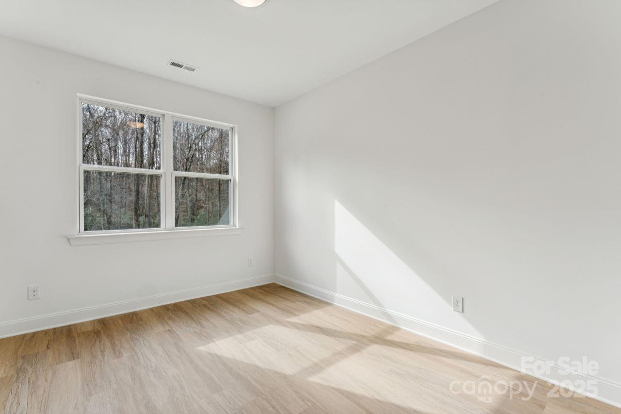 2605 Easter Street Maiden, NC 28650 - Photo 24 of 36 a view of an empty room with a window