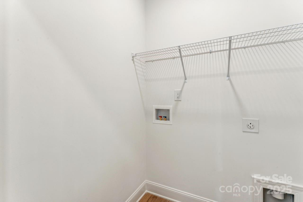 2605 Easter Street Maiden, NC 28650 - Photo 26 of 36 a bathroom with a shower and a shower head