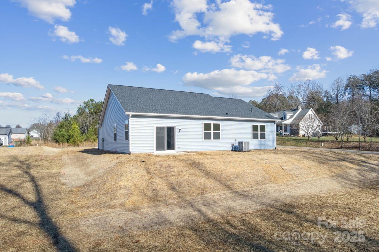 2605 Easter Street Maiden, NC 28650 - Photo 28 of 36 a front view of a house with a yard and garage