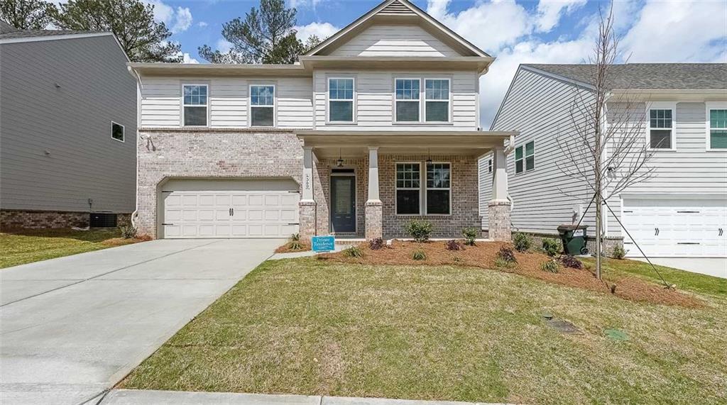 4360 Easter Lily Avenue Buford, GA 30519 - Photo 1 of 1 front view of a house with a yard