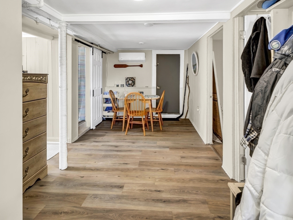 52 H Street Hull, MA 02045 - Photo 17 of 41 a view of a hallway with furniture and entryway