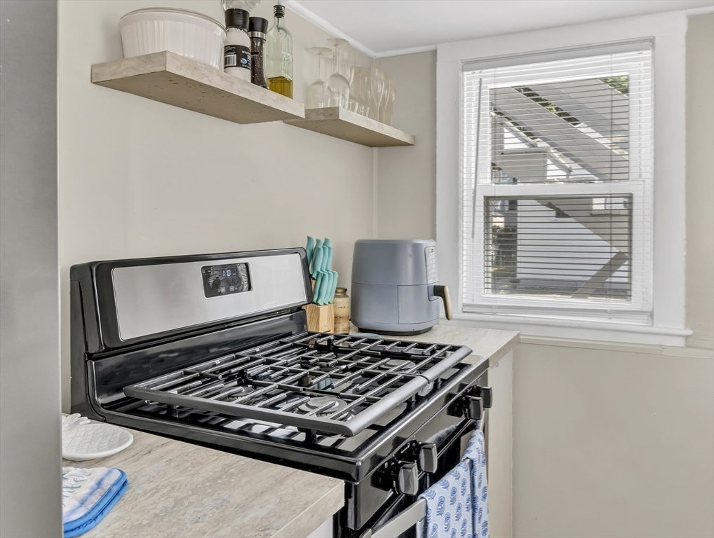 52 H Street Hull, MA 02045 - Photo 20 of 41 a stove top oven sitting inside of a kitchen