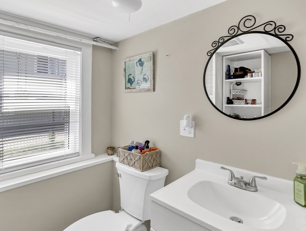 52 H Street Hull, MA 02045 - Photo 24 of 41 a bathroom with a toilet and a sink