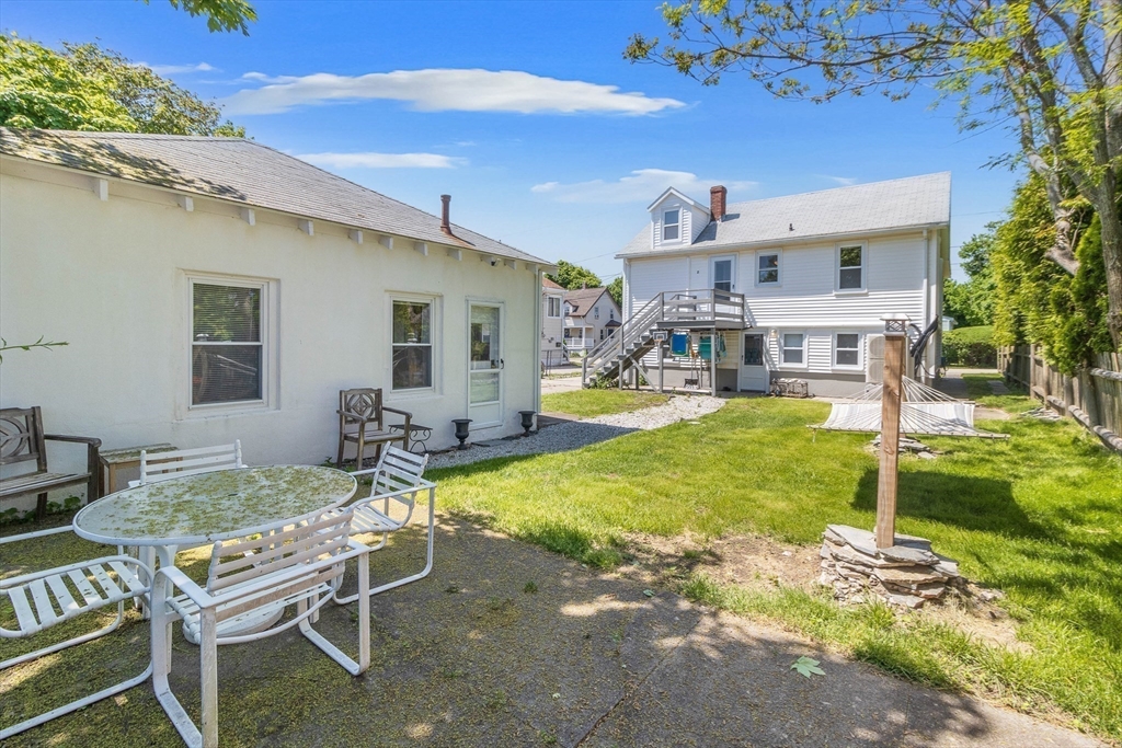 52 H Street Hull, MA 02045 - Photo 38 of 41 a view of a house with backyard porch and patio