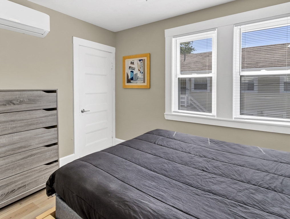 52 H Street Hull, MA 02045 - Photo 9 of 41 a bed room with a bed and a window