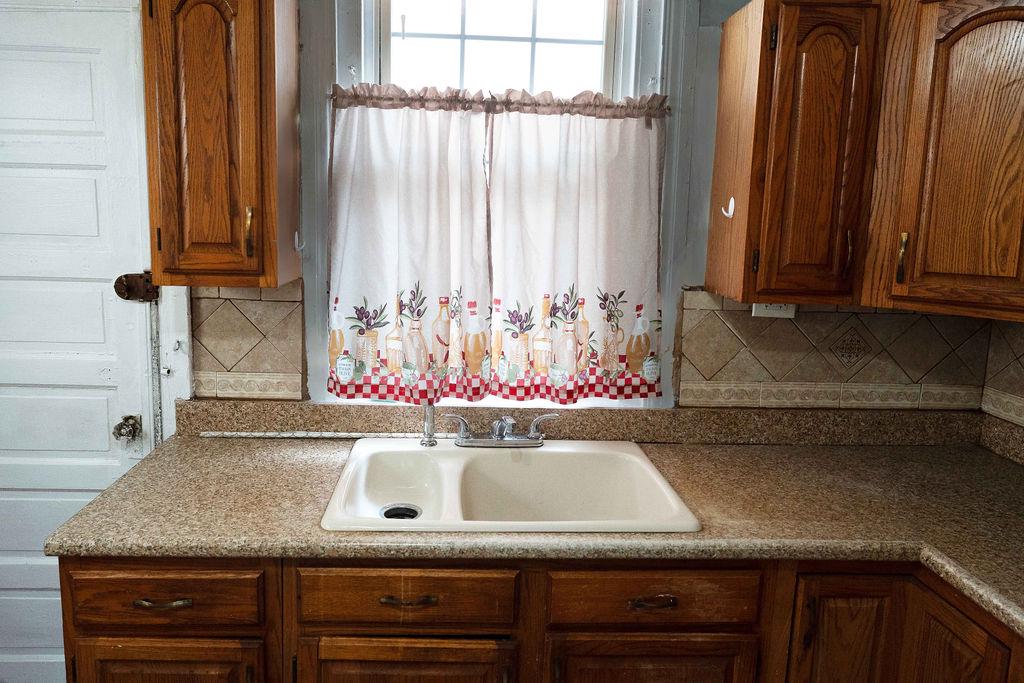 3637 Spring Garden Street Philadelphia, PA 19104 - Photo 12 of 39 a kitchen with a sink and a window