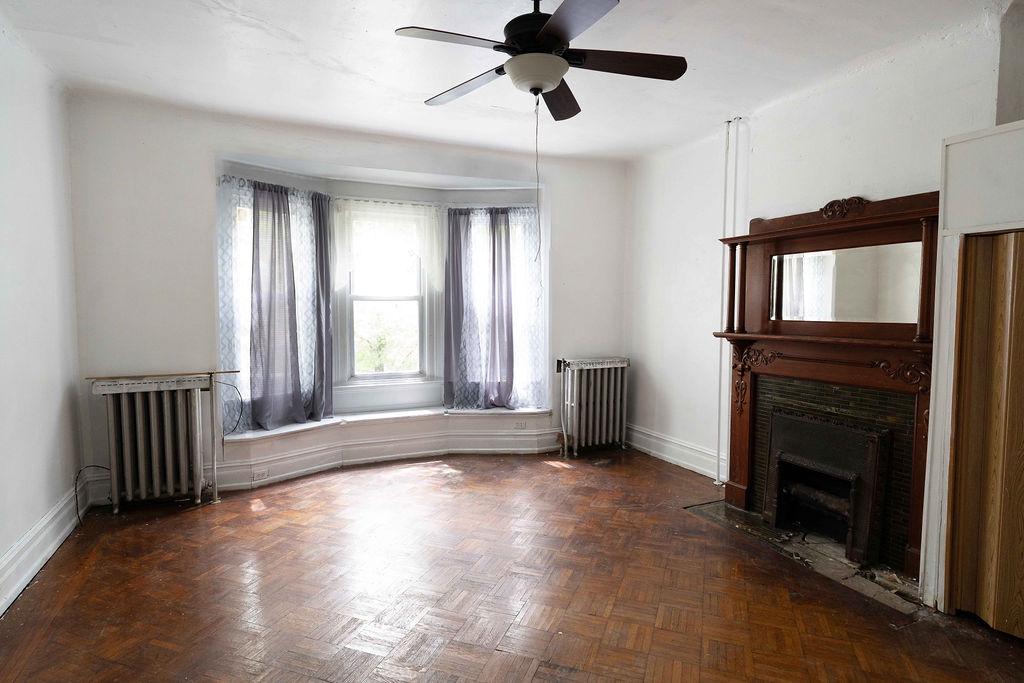 3637 Spring Garden Street Philadelphia, PA 19104 - Photo 22 of 39 a view of an empty room with window and fire place