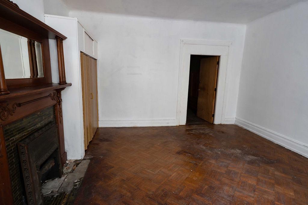 3637 Spring Garden Street Philadelphia, PA 19104 - Photo 24 of 39 a view of an empty room with wooden floor and a window