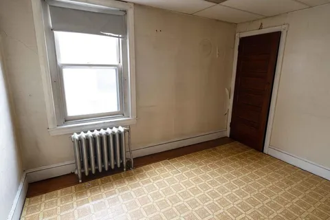 a bathroom with a bathtub sink and toilet