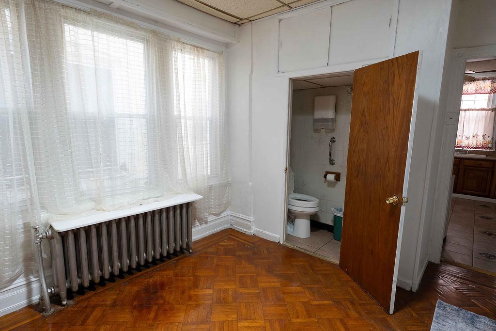 3637 Spring Garden Street Philadelphia, PA 19104 - Photo 7 of 39 a bathroom with a sink and a toilet