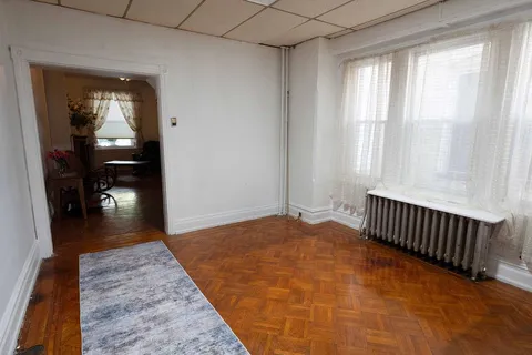 a kitchen with stainless steel appliances granite countertop a refrigerator a stove and a sink