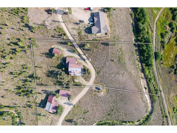 a view of outdoor space with lounge chairs