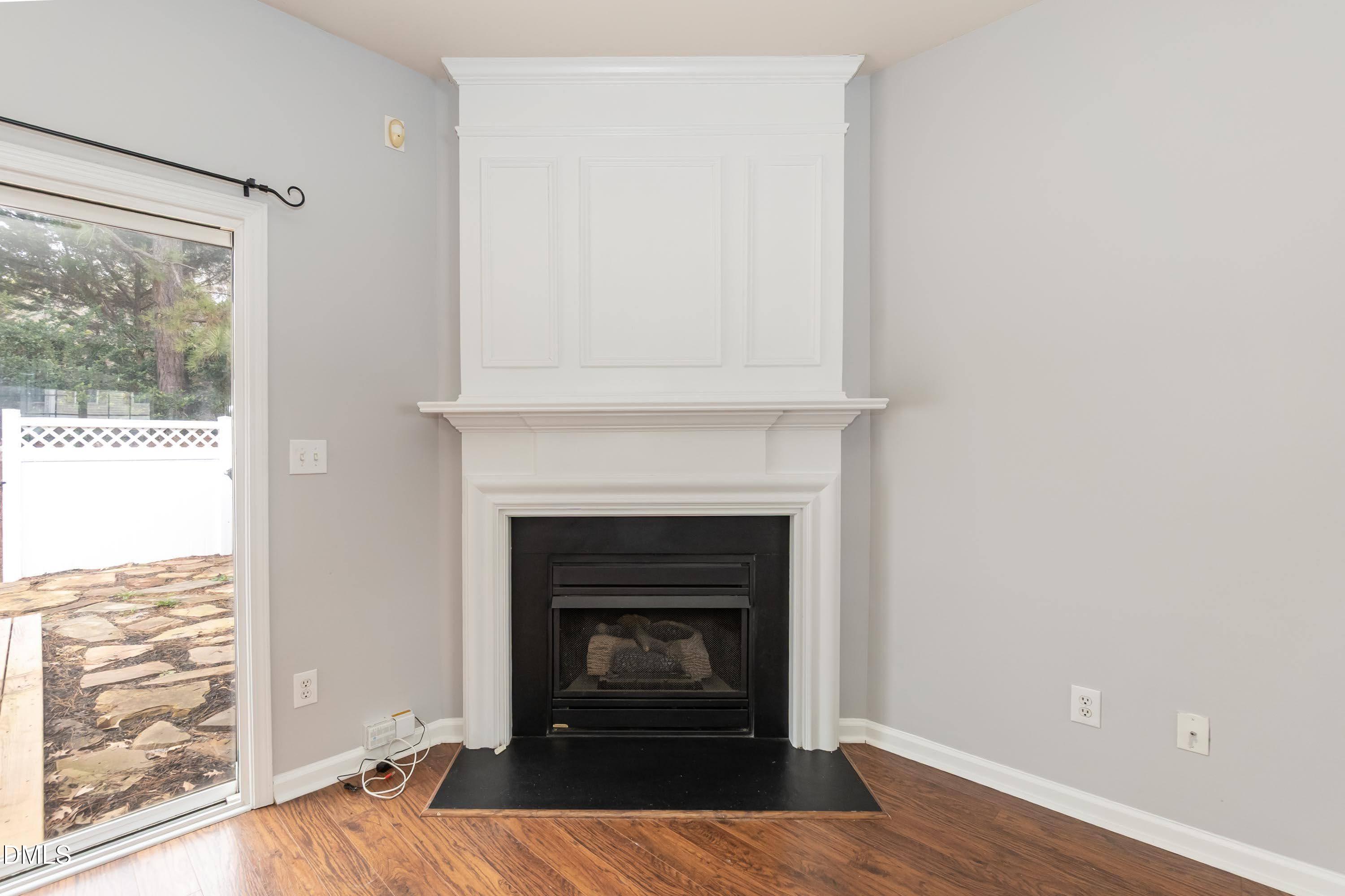 5141 TwelvePole Drive Raleigh, NC 27616 - Photo 14 of 40 a living room with a fireplace