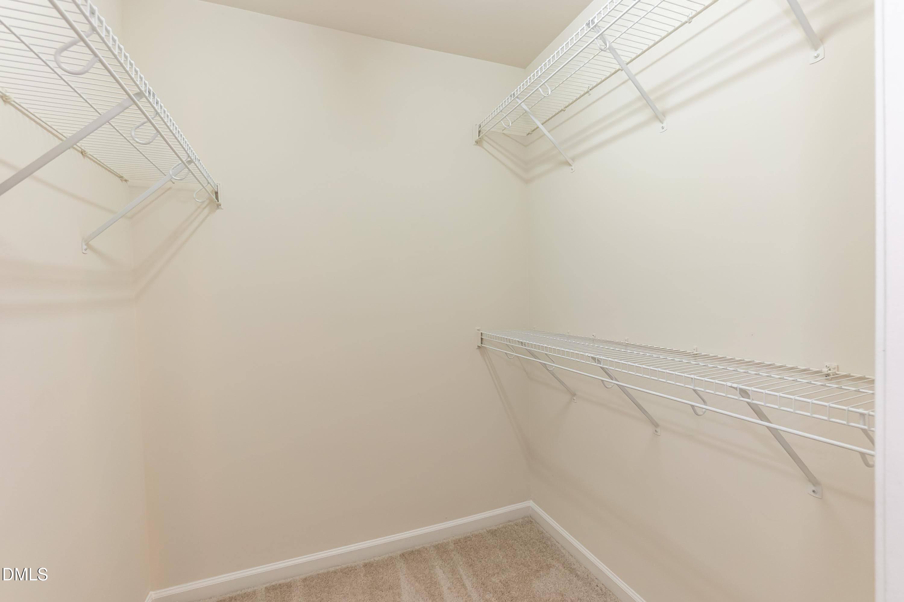 5141 TwelvePole Drive Raleigh, NC 27616 - Photo 28 of 40 a view of small space with racks on the wall