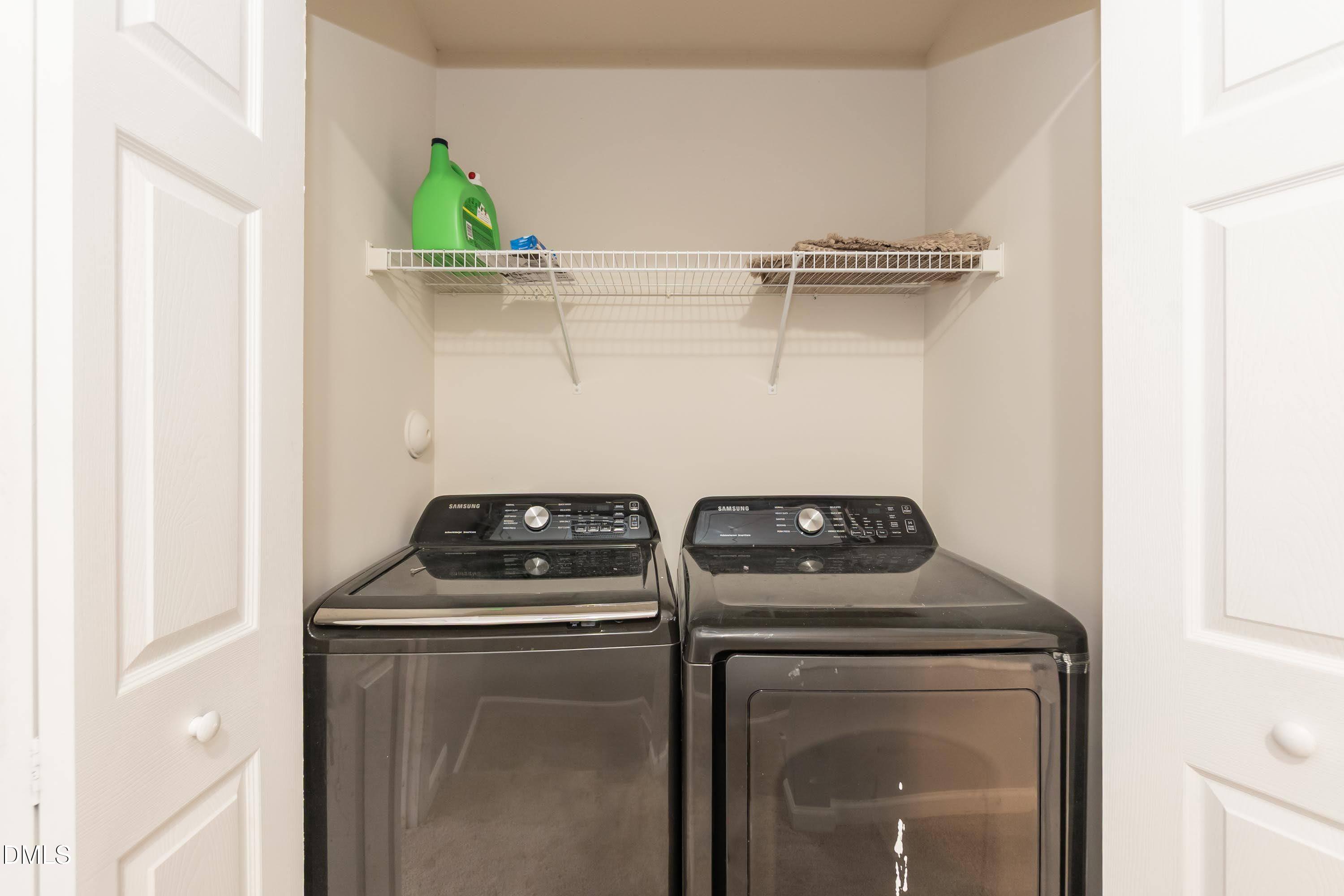 5141 TwelvePole Drive Raleigh, NC 27616 - Photo 32 of 40 a utility room with dryer and washer