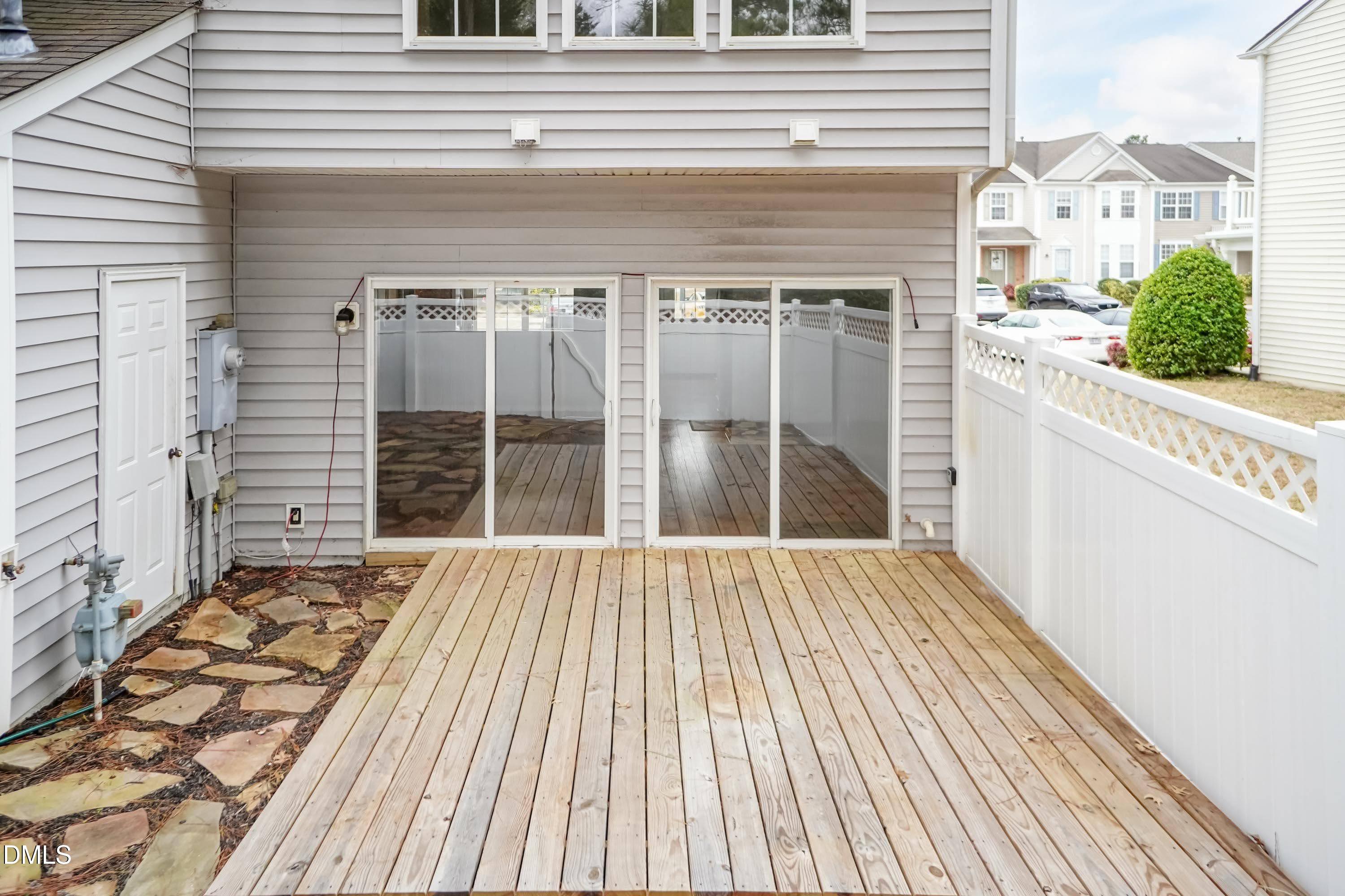 5141 TwelvePole Drive Raleigh, NC 27616 - Photo 33 of 40 a view of a balcony with wooden floor