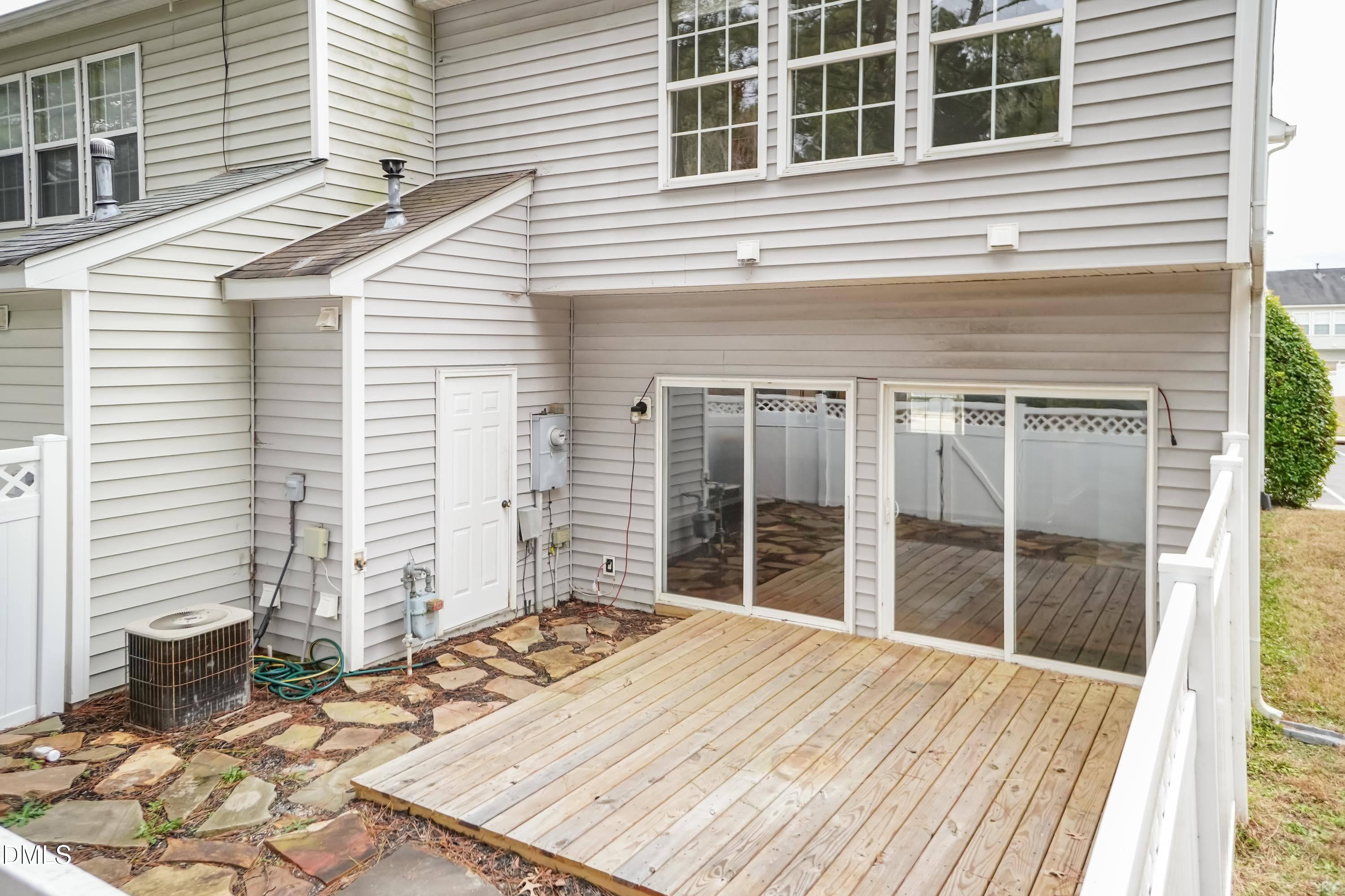 5141 TwelvePole Drive Raleigh, NC 27616 - Photo 34 of 40 a view of a house with a balcony
