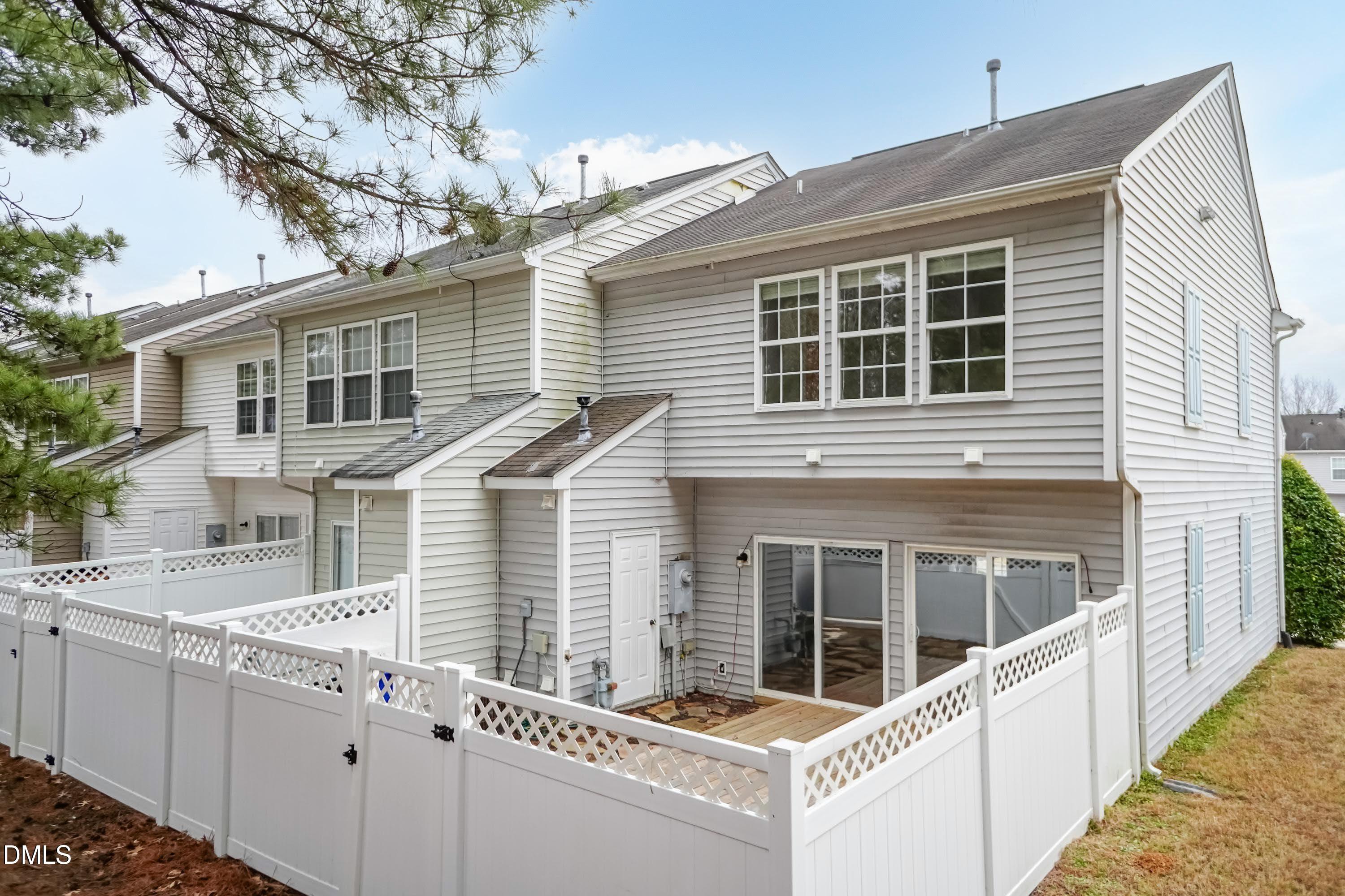 5141 TwelvePole Drive Raleigh, NC 27616 - Photo 36 of 40 a front view of a house with a balcony