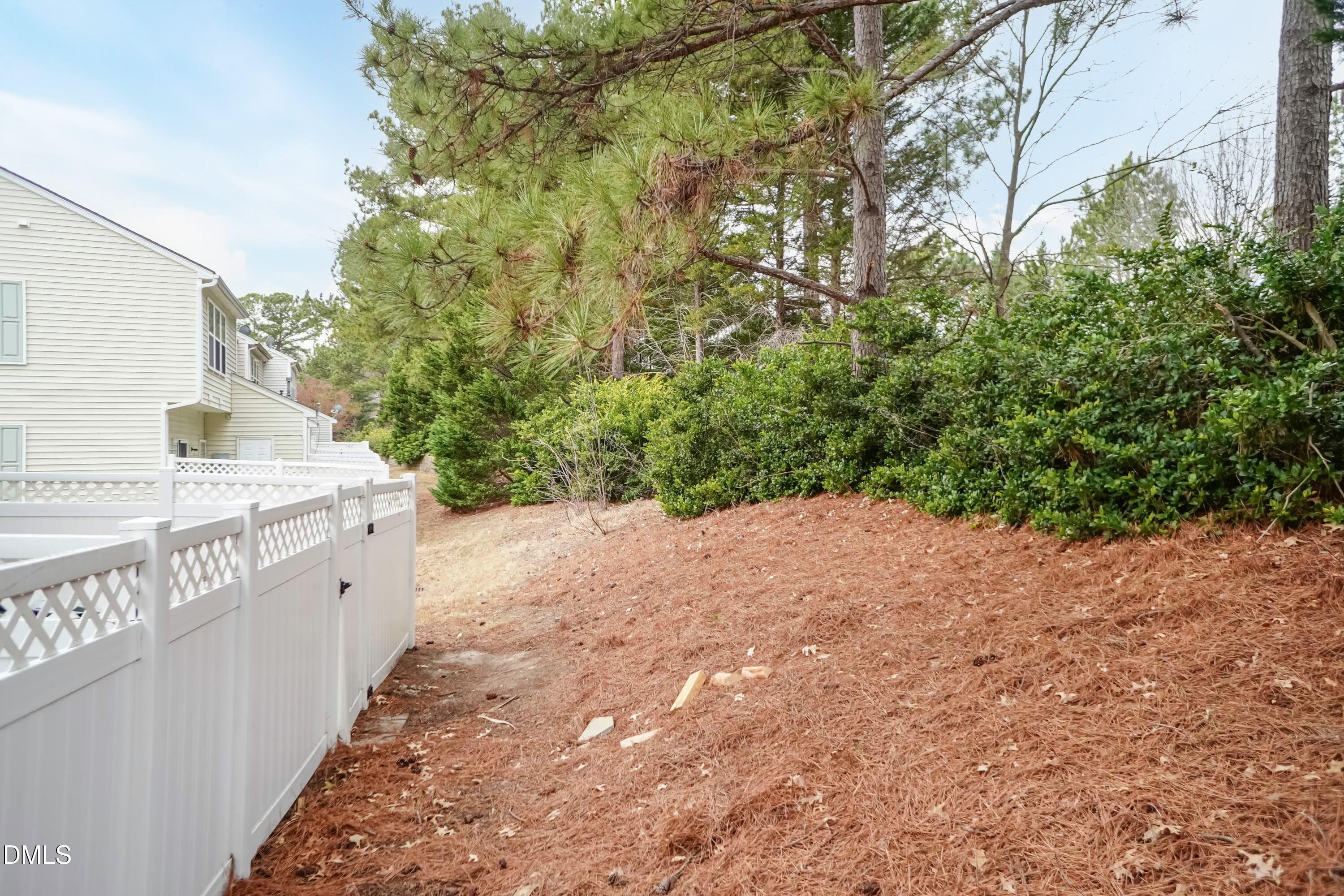 5141 TwelvePole Drive Raleigh, NC 27616 - Photo 38 of 40 a view of a pathway with a house