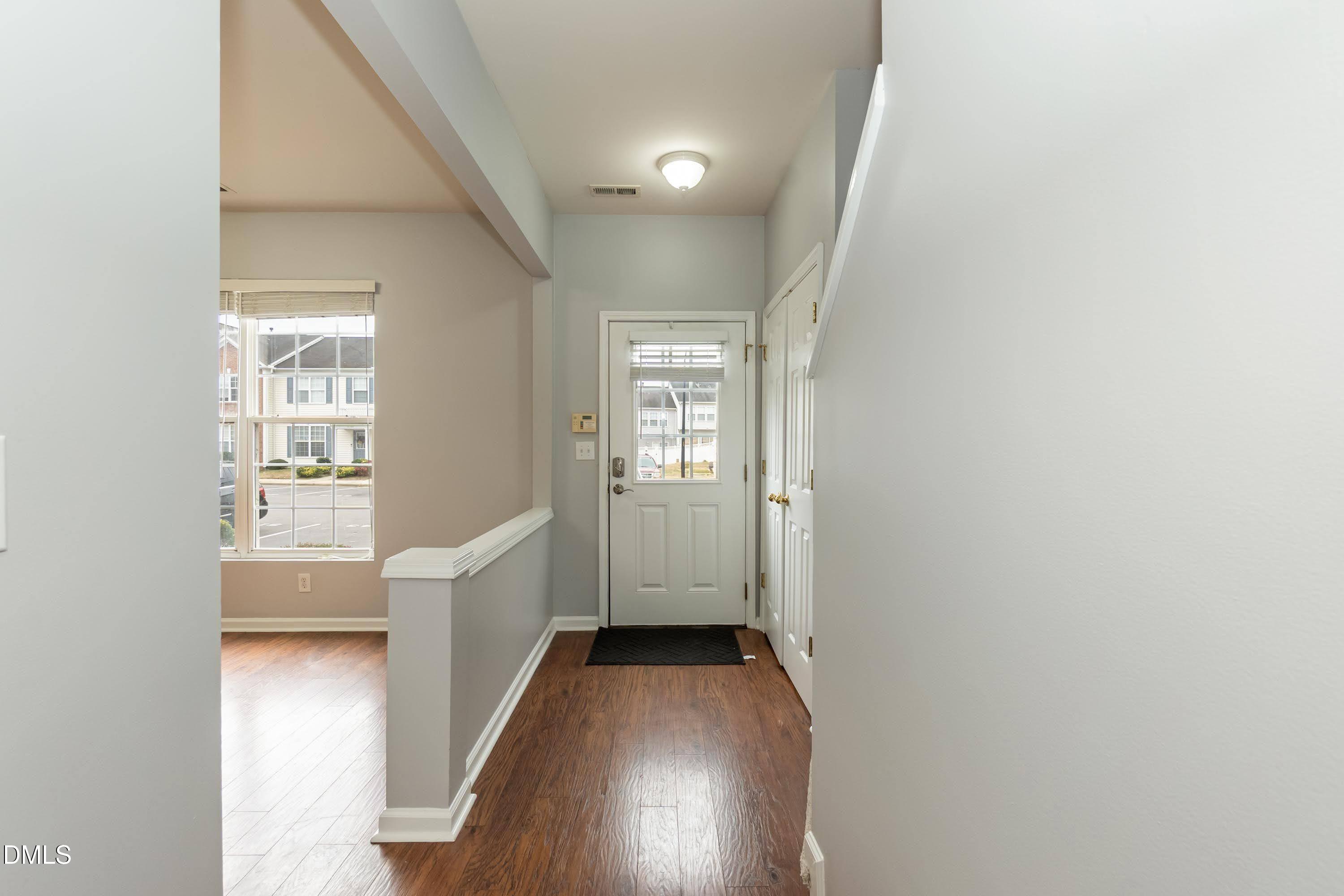 5141 TwelvePole Drive Raleigh, NC 27616 - Photo 10 of 40 a view of entryway with wooden floor