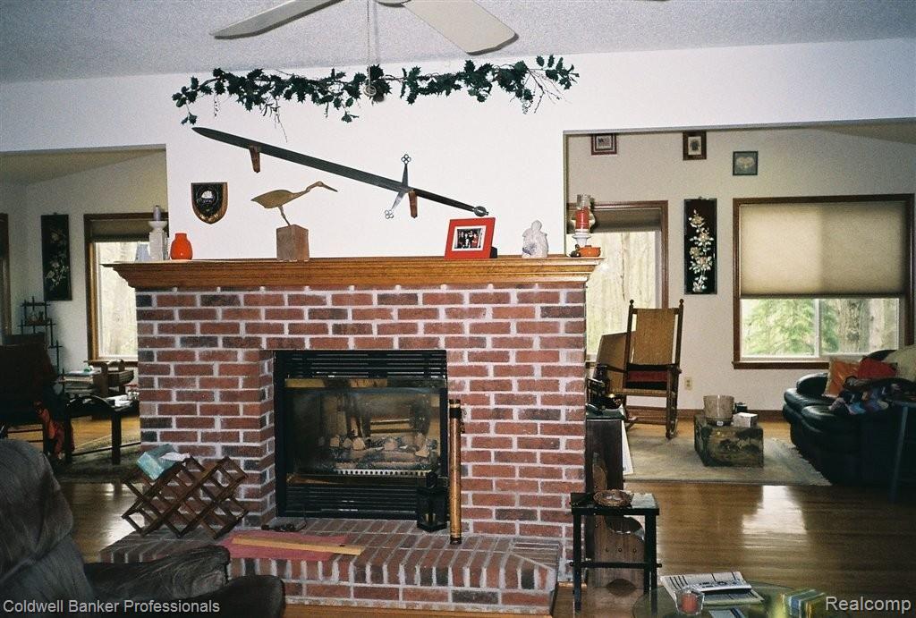 5240 Knoll Road Capac, MI 48014 - Photo 3 of 17 Two sided fireplace