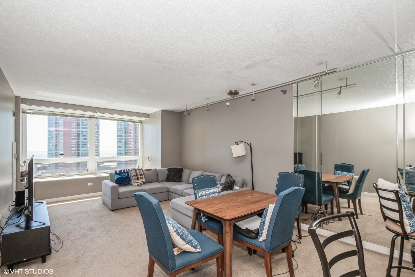Undisclosed Address Chicago, IL 60611 - Photo 4 of 15 a view of a dining room with furniture and a window