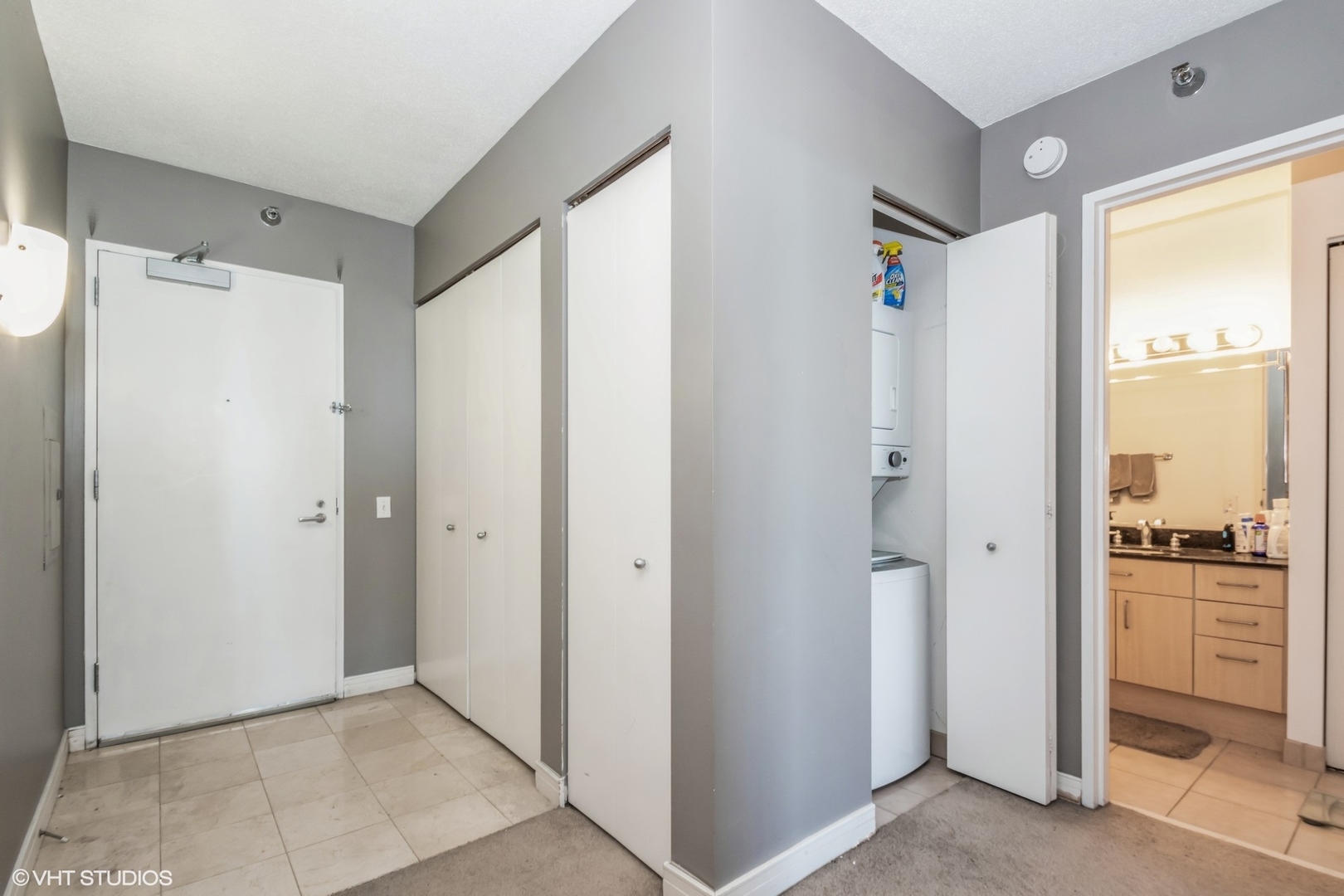 Undisclosed Address Chicago, IL 60611 - Photo 10 of 15 a view of bathroom with a shower and a sink