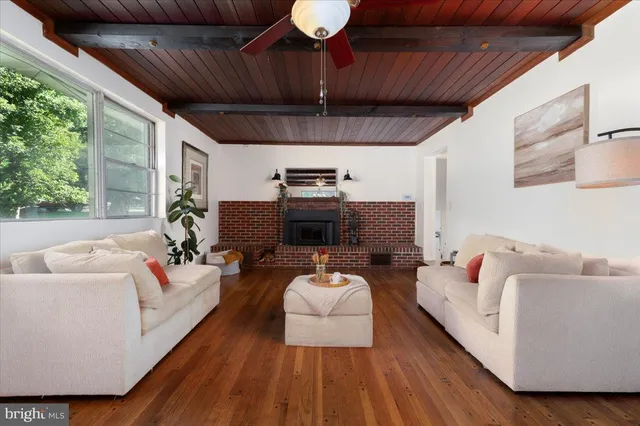 a view of a room with a large window