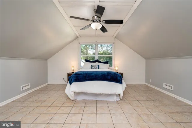 a view of a house with backyard porch and sitting area