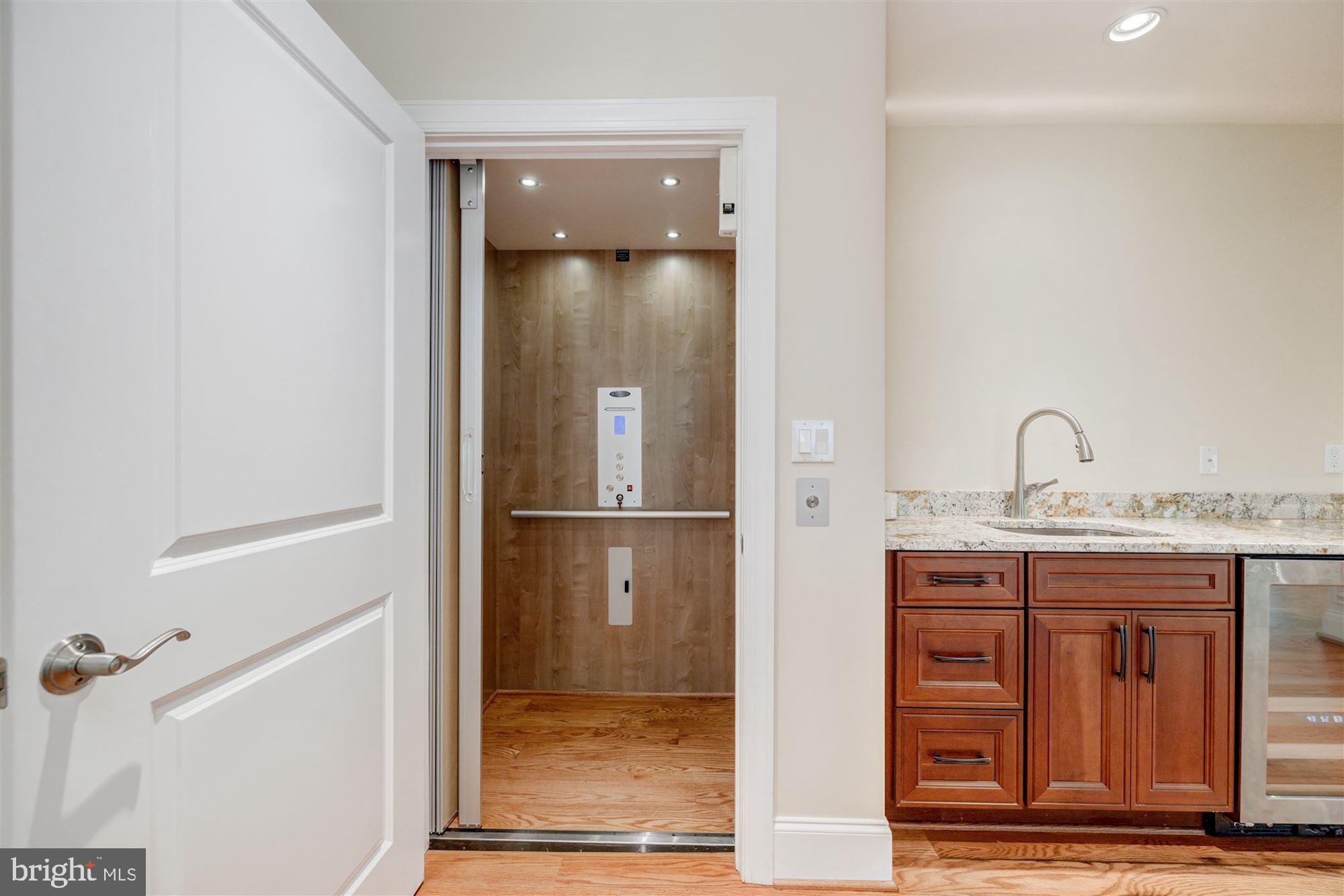 9810 Hall Road Potomac, MD 20854 - Photo 62 of 77 Elevator lower level exit