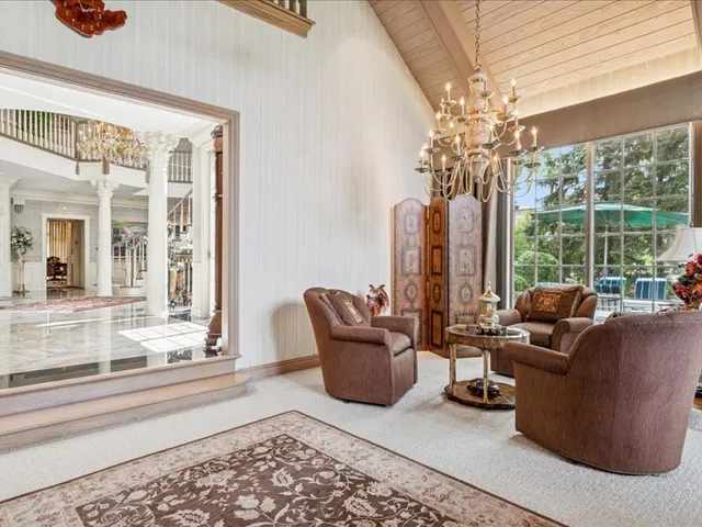 a view of a dining room with furniture window and outside view