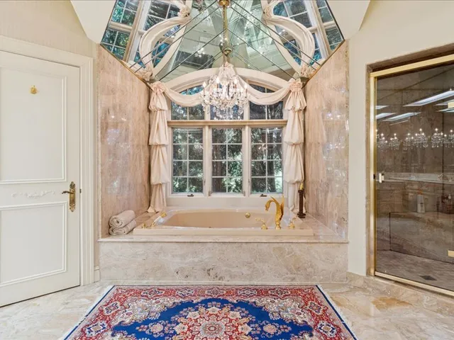 a view of a chairs and table in a patio