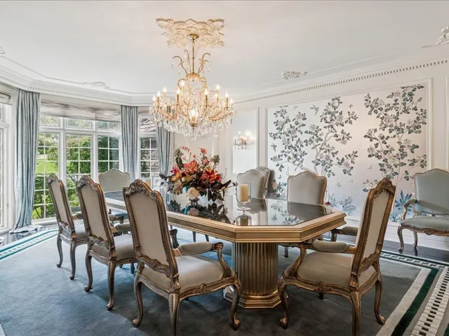 a bathroom with a sink a vanity and a mirror