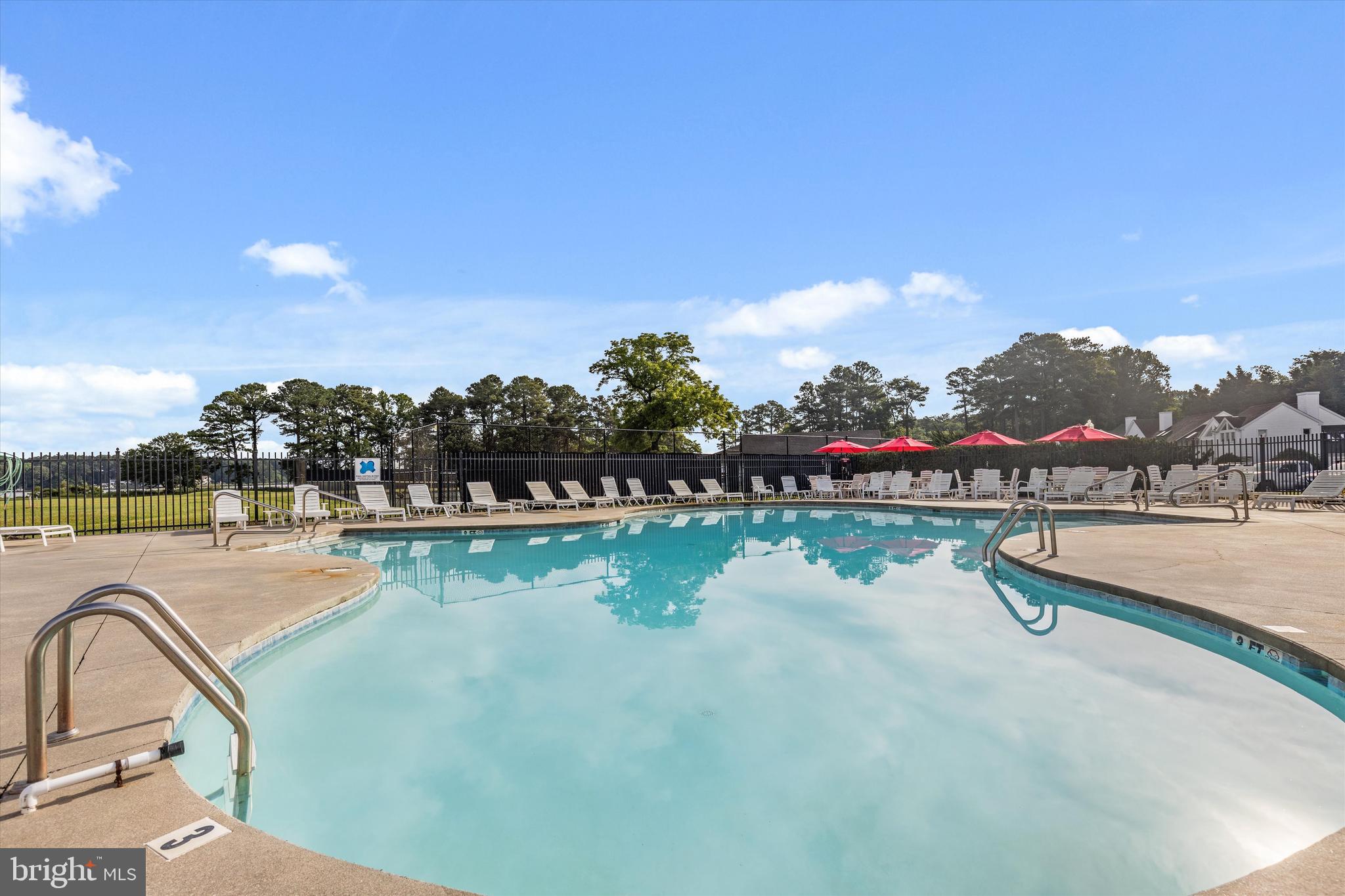 Lot #165 River Run Lane Berlin, MD 21811 - Photo 15 of 42 a view of swimming pool with outdoor seating and city view